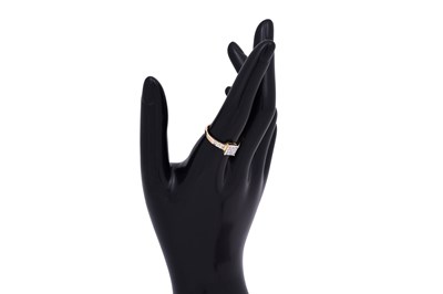 Lot 32 - A DIAMOND-SET YELLOW GOLD SQUARE TOMAS RAE RING