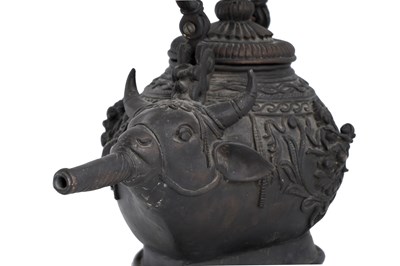 Lot 181 - A HEAVY CAST BRONZE ZOOMORPHIC SHAIVITE CEREMONIAL WATER VESSEL (GOWMUKHI)