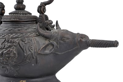 Lot 181 - A HEAVY CAST BRONZE ZOOMORPHIC SHAIVITE CEREMONIAL WATER VESSEL (GOWMUKHI)