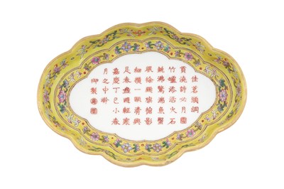 Lot 122 - A CHINESE FAMILLE ROSE YELLOW-GROUND QUATREFOIL DISH