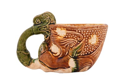 Lot 82 - A CHINESE SANCAI-GLAZED RHYTON
