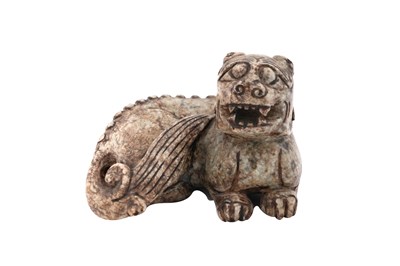 Lot 49 - A SMALL CHINESE CHICKEN BONE JADE CARVING OF A MYTHICAL BEAST