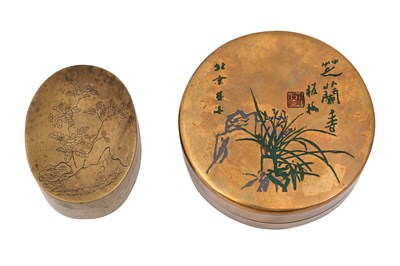 Lot 62 - TWO CHINESE BRASS FLINT BOXES AND COVERS