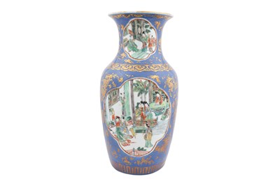 Lot 5 - A CHINESE POWDER BLUE-GROUND FAMILLE ROSE VASE