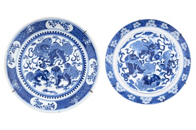 Lot 20 - TWO CHINESE BLUE AND WHITE 'LION DOG' DISHES