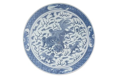 Lot 21 - A MASSIVE CHINESE BLUE AND WHITE 'LION DOG' CHARGER