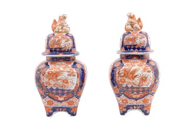 Lot 198 - A PAIR OF JAPANESE IMARI JARS AND COVERS