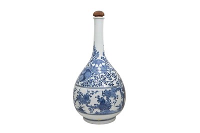 Lot 72 - A LARGE BLUE AND WHITE ARITA 'PRUNUS AND PINE' BOTTLE VASE