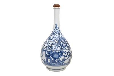 Lot 72 - A LARGE BLUE AND WHITE ARITA 'PRUNUS AND PINE' BOTTLE VASE