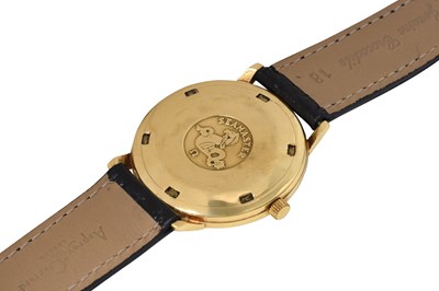 Lot 83 - A MEN'S OMEGA 18K YELLOW GOLD AUTOMATIC WRISTWATCH.